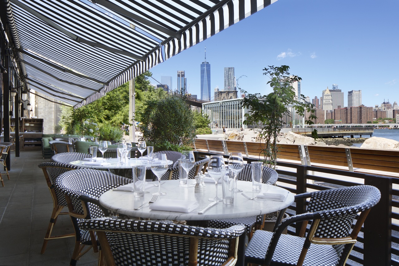 The outdoor terrace with views of Manhattan